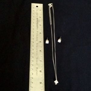 Necklace appears to be cubic zirconia, large size, matching pierced earrings